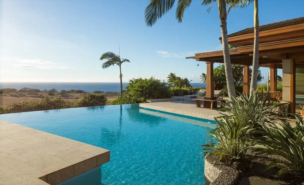 infinity pool overlooking a beach