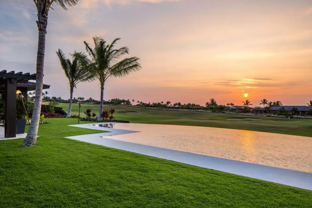 Beautiful Sunset View By A Garden Pool