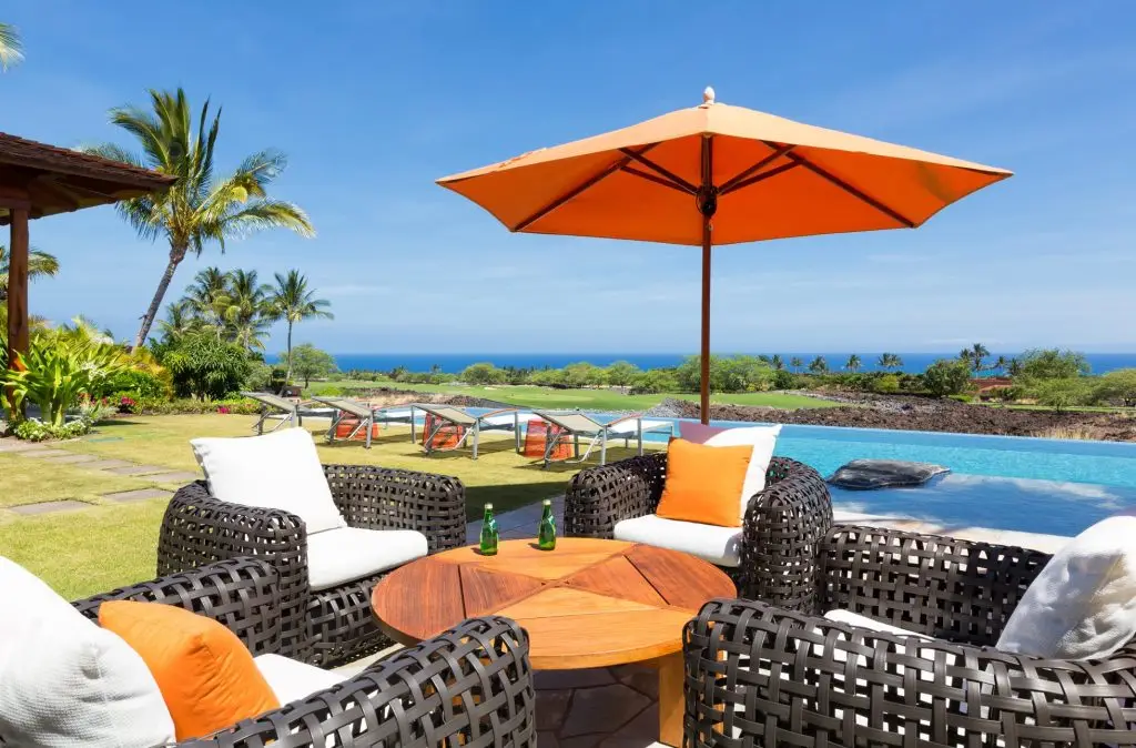 Hualalai Poolside Chair And Tables With Orange Outdoor Umbrella